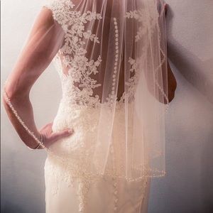 Beaded and pearl medium length wedding veil